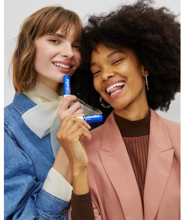 NIVEA Labello Original (4 x 5.5 ml) Lip balm enriched with natural oils and with a creamy texture Lip care Long-lasting hydration for 24 hours - Buy Online on GoSupps.com