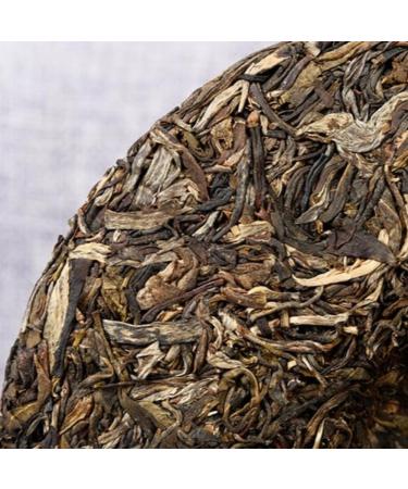 HQZM Yunnan Laobangzhang 357g PuErh Raw Tea Cake Bold Flavor with the Dem anor of the Tea King - Buy Online on GoSupps.com
