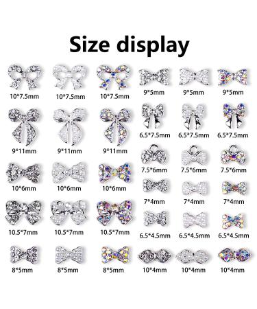 JERCLITY 33 Pcs Silver Alloy Bow Nail Charms - Iridescent Rhinestone & Pearl Nail Art Studs for Women & Girls - Buy Online on GoSupps.com