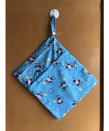 MUMBABY Wet Dry Bag | Reusable Nappy Diaper Bag with Two Zippered Pockets (Monkey) - Buy Online on GoSupps.com
