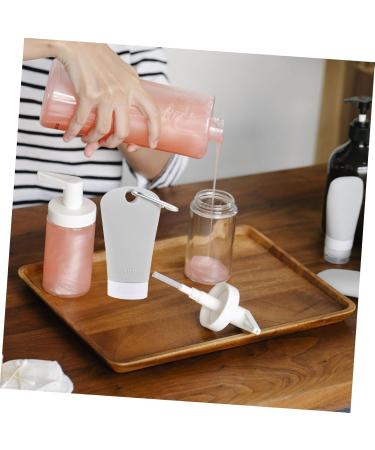 DOITOOL 4 Pcs Shampoo Squeeze Bottles with Keychain Travel Empty Lotion Bottle Bottled Combination Filling - Buy Online on GoSupps.com