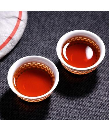 Th Puer m r Yunnan Th noir Tong Qing Hao 357g G teau au th Pu-erh Th chinois - Buy Online on GoSupps.com