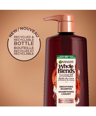 Garnier Whole Blends Smoothing Shampoo for Frizzy Hair with Coconut Oil and Cocoa Butter Extract Paraben-Free 828ml Shampoo 828 ml (Pack of 1) - Buy Online on GoSupps.com