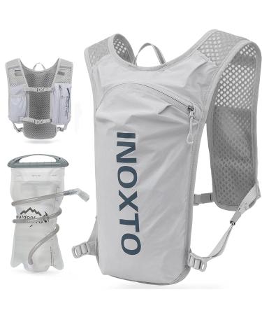 Inoxto drinking vest backpack light water running vest with 1.5 l water bladder daily backpack for hiking trail running cycling racing marathon for women and men black green basic