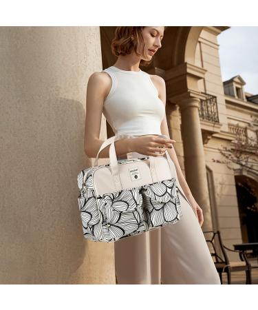 SONARIN Large Capacity Waterproof Baby Changing Tote Bag - Multi-Function Satchel Messenger Bag with Shoulder Strap & Changing Mat, Black & White Petals - Buy Online on GoSupps.com