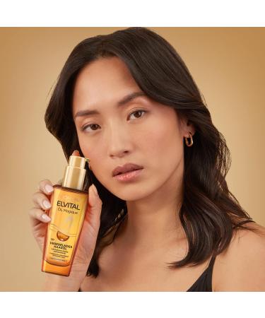 L'Or al Paris Elvital Magic Oil 100ml - Nourishing Hair Oil for Soft Shiny Hair Frizz Control & Heat Protection up to 230 C with 6 Precious Flower Oils - Buy Online on GoSupps.com