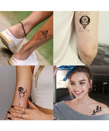 Tazimi Black Mountain Temporary Tattoos - 35 Sheets Waterproof Forest Sun Star Moon Space Designs for Men and Women | Body Art and Face Tattoos - Buy Online on GoSupps.com