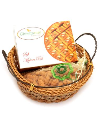 Ghasitaram Gifts Diwali Gifts Diwali Hamper Sweet Hampers - Small Cane Basket with Mysore Pak and Almonds Pouch