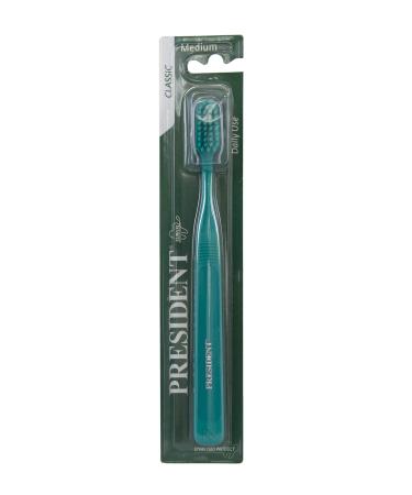 President Classic Medium bristles with rounded tip flat cut for plaque action with nail polish and gums