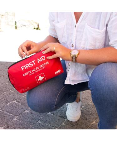 First Aid Bag for Companies & Home | DIN 13157 Certified | Red Association Pocket with Filling | Portable First Aid Kit - Buy Online on GoSupps.com