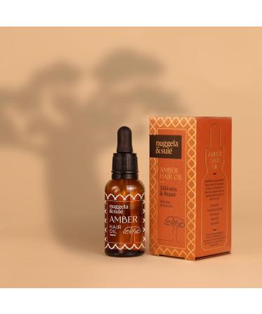 Nuggela & Sul AMBER Hair Oil. Silky & Repairing. Combination of 5 oils from the African continent to transform hair. With Baobab Oil and Shea Butter. 1 x 30 ml - Buy Online on GoSupps.com