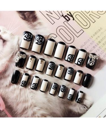 Hujl 24-Piece Bling Bowknot Punk Black & White Artificial Nails Set | Easy Full Lid Nail Art for Stunning Looks - Buy Online on GoSupps.com