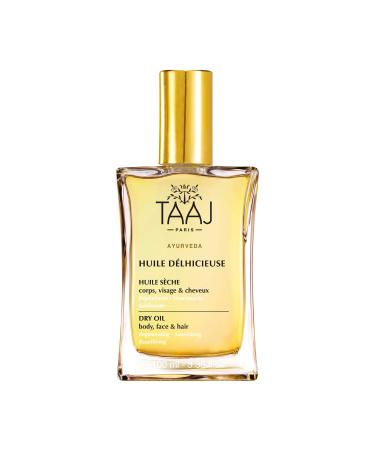 Taaj |Delicious oil |Dry beauty oil |Body face & hair |Nourish protect and revitalize the skin |Satin skin |96 % ingredients of natural origin |Vegan |100 ml