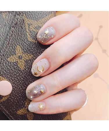 TOROKOM 12 Sheet Metallic Self-Adhesive Nail Stickers - 3D Star Moon Leaf Line Design Decals for Women, Girls | Manicure Fingernail Decorations - Buy Online on GoSupps.com