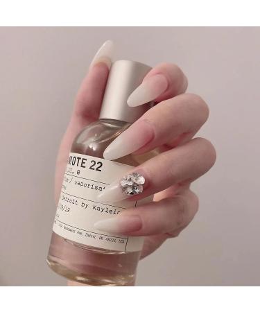 MERVF Almond Nude Stiletto Press on Nails with Diamond Designs - 24pcs Glossy Fake Acrylic Nails for Women and Girls - Buy Online on GoSupps.com