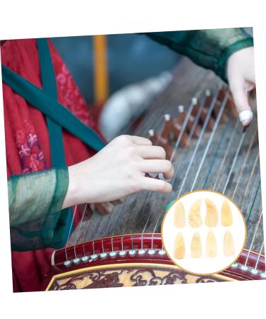 WOFASHPURET 8pcs Guzheng nails guitar picks for kids guzheng picks acoustic guitar picks bass finger picks guzheng ox horn pick thin guitar picks thumb picks child finger guard Ukulele horns 3X1.2X0.1CM Light Yellow 01 - Buy Online on GoSupps.com