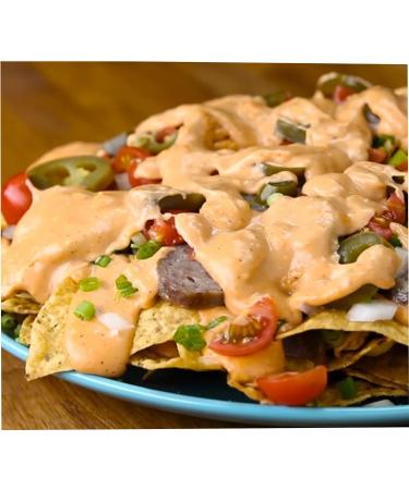 Nacho Cheese Sauce 1L Cheese sauce made with real cheddar. Ideal for nachos dirty fries chips wedges hot dogs chicken waffles & pasta. great to make homemade nacho's and dip over Christmas - Buy Online on GoSupps.com