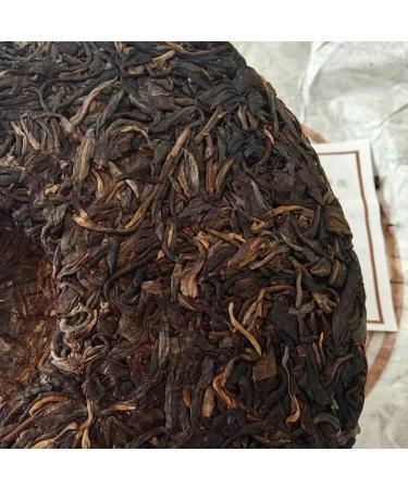 Pu-Erh tea 2009 Yiwu Gongrui-Yiwu wild round tea 357g Raw - Buy Online on GoSupps.com