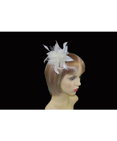 Cream chiffon flower & feather fascinator on comb. Perfect for weddings races or other special occasions. - Buy Online on GoSupps.com