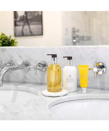 Molton Brown Flora Luminare Hand Lotion 300ml - Luxury Hand Cream Rejuvenating Moisturizer International Shipping Available - Buy Online on GoSupps.com