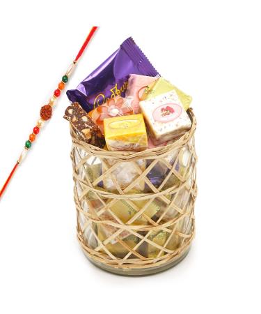 Ghasitaram Gifts Rakhi Gifts for Brothers Cane Glass Jar with Assorted Bites Laddoos and Cookies with Rudraksh Rakhi
