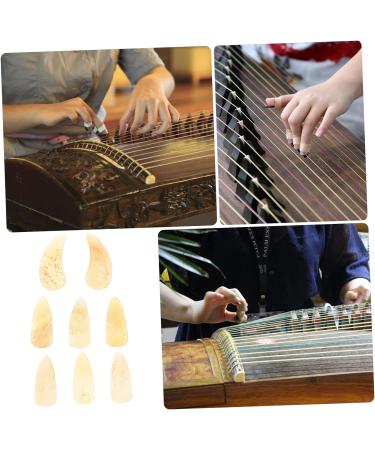 POPETPOP 8pcs Guzheng nails acoustic guitar pick ox horn pick Guzheng Nail Covers mandolin picks Guzheng Finger Picks ukulele pick Fingertip Covers finger guard horns trumpet child 2.7X1.2X0.1CM Yellow - Buy Online on GoSupps.com