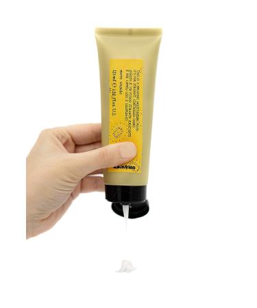 Davines Relaxing Moisturizing Fluid 4.22 Fl. Oz. | Heat Protection, Frizz Control, Sleek & Straight Styling - Buy Online on GoSupps.com