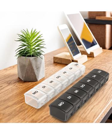 Buy Sukuos 7-Day Pill Box with 2 Compartments | Moisture-Resistant Medication Organizer (Black & White) International Shipping - Buy Online on GoSupps.com