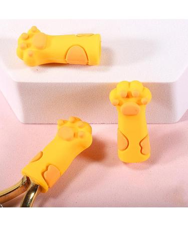 Cute Cat Paw Shape Silicone Nipper - Cuticle Trimmer Nippers Case - Silicone Cuticle Nail Protector in Cat Paw Shape Protective Cases for Small Scissors Nail Clippers and Tweezers/l Yellow - Buy Online on GoSupps.com
