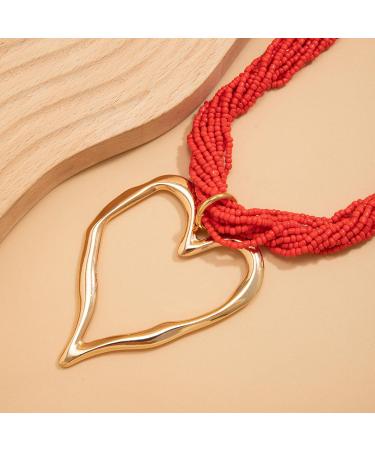 Shop Oralgo's Fashionable Multi-Layered Pearl Choker Necklace with Large Metal Heart - Gold & White Statement Jewelry for Collarbone Style - International Shipping Available - Buy Online on GoSupps.com