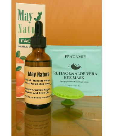 May Nature Face Oil/Huile de Visage A nourishing blend of tangerine coconut and olive oils that hydrates softens and restores your natural glow perfect for daily use on all skin types.