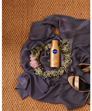 Nivea Body Lotion Firming + Tanning 200ml | Best International Shipping | Moisturize & Enhance Skin Tone - Buy Online on GoSupps.com