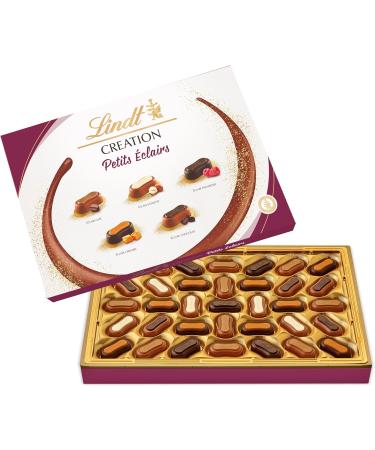 Lindt - CREATION Petit clairs box - Assortment of Milk Chocolates Black and White - Bakery inspiration - Ideal for Christmas 384 g - Buy Online on GoSupps.com