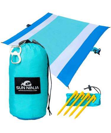 SUN NINJA Sand Free Beach Blanket - Outdoor Blanket, Beach Mat & Accessories - 10ft X 9ft Lightweight Blanket with Storage, Bottle Opener, Carabiner, Shoulder Strap, Corner Sand Pockets & 4 Stakes Blue