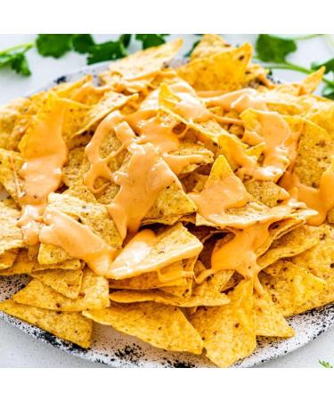 Nacho Cheese Sauce 1L Nacho sauce cheese sauce made with real cheddar. Ideal for nachos dirty fries hot dogs burgers chicken waffles & pasta.Cheezy Nacho Sauce 1L Restaurant Quality Sauce. - Buy Online on GoSupps.com