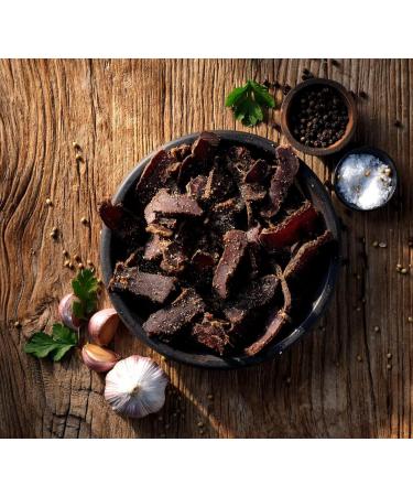 Garlic Pepper Sliced Biltong 5 x 50g (250g) Natural Spicy Beef Biltong by The Biltong Company High in Protein & Keto Diet-Approved Lean Biltong Spiced Meat Snack Like Jerky Garlic Pepper 50 g (Pack of 5) - Buy Online on GoSupps.com
