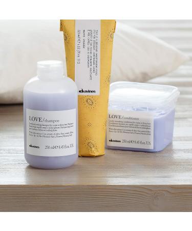 Davines Relaxing Moisturizing Fluid 4.22 Fl. Oz. | Heat Protection, Frizz Control, Sleek & Straight Styling - Buy Online on GoSupps.com