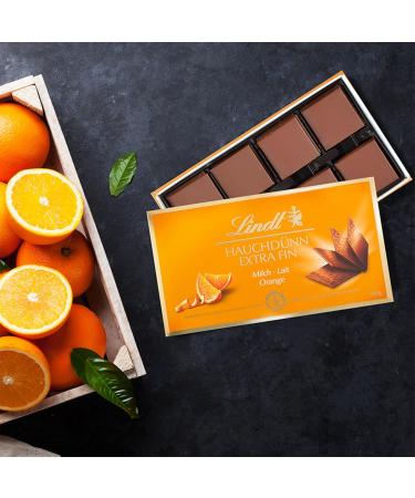  Lindt Lindt - Box of EXTRA FINE chocolate squares - Milk chocolate orange - 180g - Buy Online on GoSupps.com