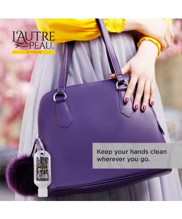 L'Autre Peau Travel Hand Sanitizer Gel - Citrus Scented, Alcohol-based with Aloe Vera & Vitamin E - 2oz 3 Pack with Carabiner Clip - Buy Online on GoSupps.com