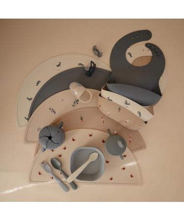 Mushie Baby Silicone Bib | Adjustable Waterproof Feeding Bib with Deep Pockets | BPA-Free Rocket Design - Buy Online on GoSupps.com
