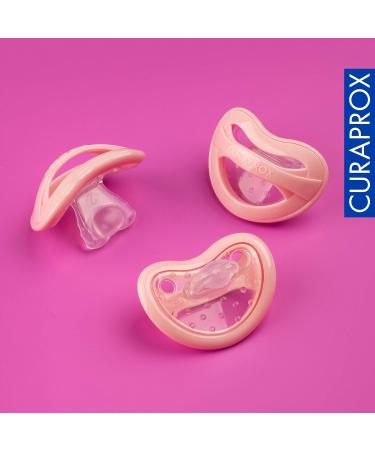 Curaprox Pink Baby Pacifier with Storage Box | Size 0 | Soothing Pacifier for Newborns 0-7 Months - Buy Online on GoSupps.com