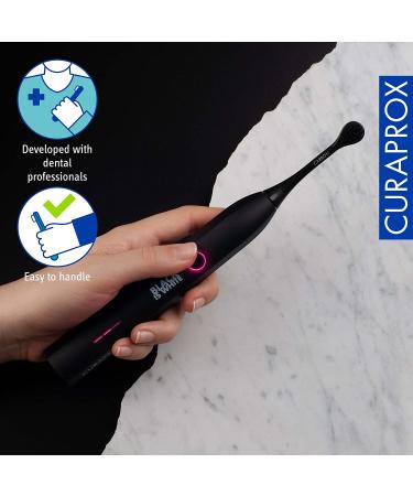 Curaprox Black is White Hydrosonic Electric Toothbrush with Charger and Travel Case - Ultimate Dental Care Kit - Buy Online on GoSupps.com