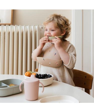 Mushie Baby Silicone Bib | Adjustable Waterproof Feeding Bib with Deep Pockets | BPA-Free Rocket Design - Buy Online on GoSupps.com