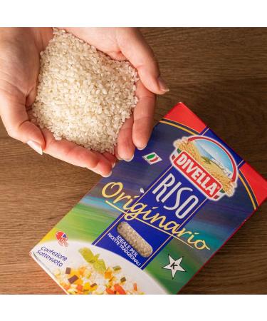 Divella Original Rice - Lot of 5 grains of round rice - Italian rice - Id al for traditional recipes - Packaging sous vide of 1 kg + 1 packet of talc powder Felce Azzurra - Sachet of 100 - Buy Online on GoSupps.com