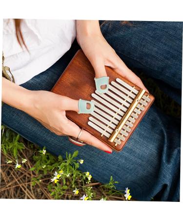 2 Pairs Kalimba Finger Cots | Silicone Thumb Protectors & Covers for Optimal Playing Comfort - Buy Online on GoSupps.com