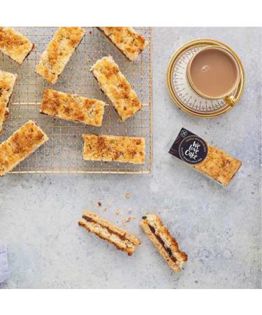 Apricot Macaroon Slices(18) ..Gluten wheat & dairy free. Individually wrapped. Shortbread bases with apricot filling & toasted coconut topping.
