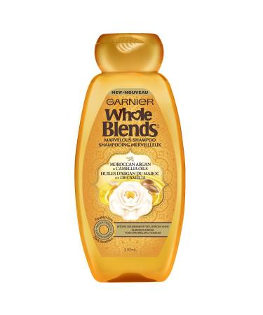 Garnier Whole Blends Shampooing aux extraits d'argan et de cam lia marocain 32 ml (1 pi ce)