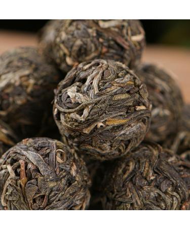 HQZM Classic Yunnan Puerh Tea First Spring 200g705oz Xigui Old Tree Longzhu Aged Puerh Raw Tea - Buy Online on GoSupps.com