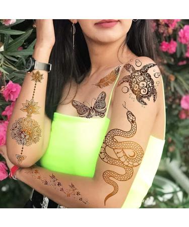 Rejaski 9 Sheets Flash Gold Metallic Temporary Tattoos - Bohemian Designs for Women, Adults - Fake Tattoo Stickers with Indian Tribal Elephant, 3D Wolf, Lion, Snake, Mandala Flower, Halloween Skull, Butterfly, Feather, Glitter - Buy Online on GoSupps.com