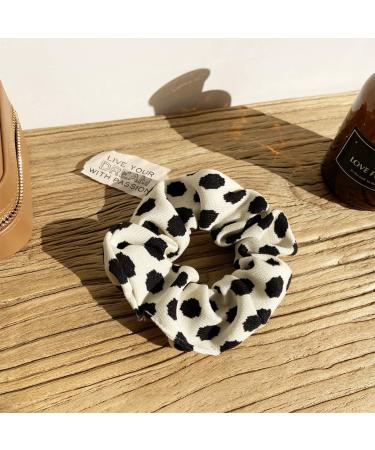 Sukokola Black Dots Hair Ties for Women | Strong Elastic White Bobbles for Ponytails | Stylish Hair Accessories & Scrunchies - Buy Online on GoSupps.com